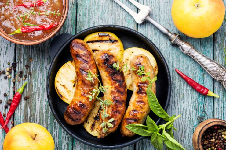 Delicious sausages grilled with spices and apples.Meat German food