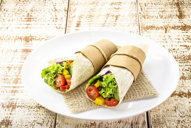Burritos wraps with mushrooms, pepper and vegetables, spicy Mexican food
