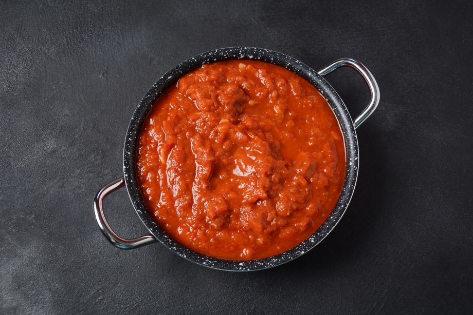 Matbucha - Moroccan Tomato dip, spread or condiment - Cooked Spicy Tomatoes, Peppers, Garlic and Chili Pepper