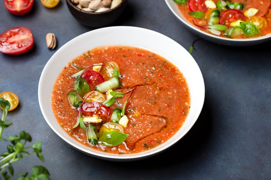 Spanish fresh cold tomato soup gazpacho with Basil