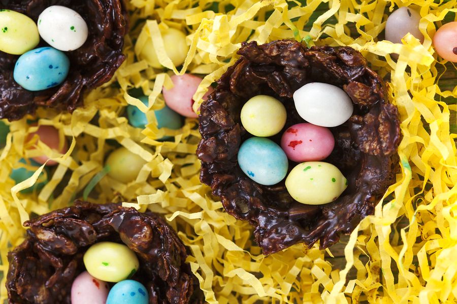 Chocolate Nest with colorful egg candy. Easter dessert