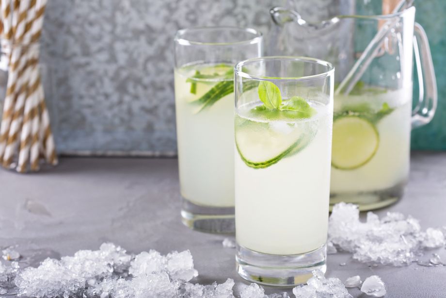 Basil lime and cucumber cooler in pitcher and tall glasses