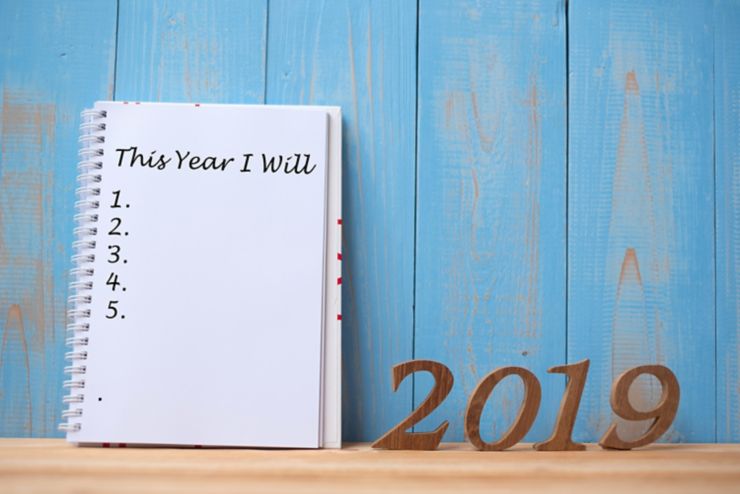 2019 Happy New years with notebook " This Year I Will " text and wooden number on table and copy space. New Start, Resolution, Goals and Mission Concept